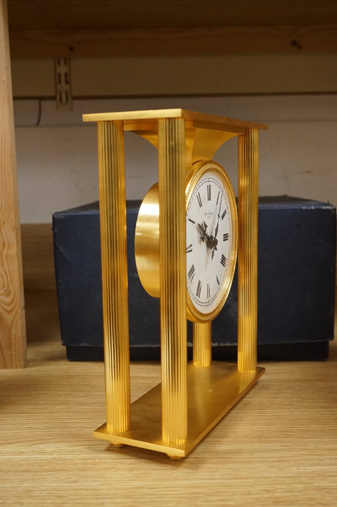 A 1970's Hour Lavigne gilt bronze clock, boxed, 26cm